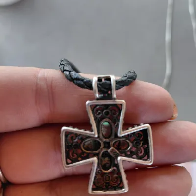 Sale Photo Thumbnail #214: Sterling Silver Cross with Abalone/Mother of Pearl on Black Braided chain.