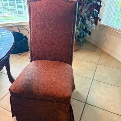 One of four chairs with dining set.