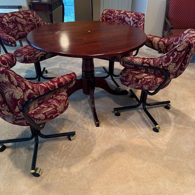 Vintage Dining Table Set with 4 Upholstered Chairs on wheels.
