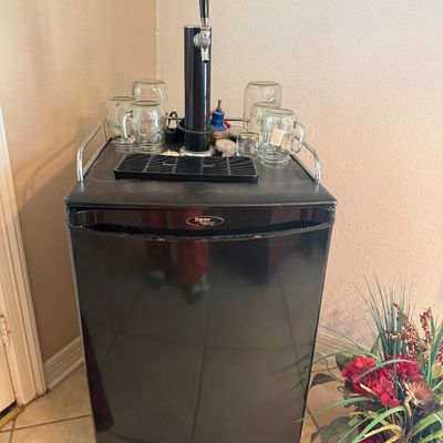 Danby Kegerator, a compact refrigerator modified to dispense draft beer from a Keg.