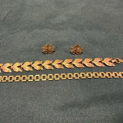 2 Copper Bracelets And 1 Set Of Earrings 