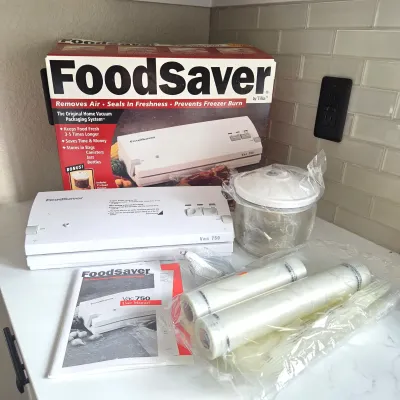 Sale Photo Thumbnail #78: FoodSaver Vac 750 Vacuum Sealing System with Canister, Bags & Manual