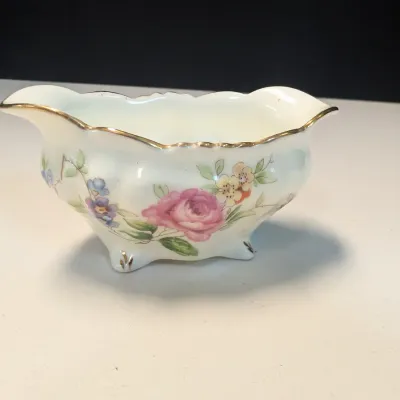 A beautiful 4-piece collection of Hammersley & Co. fine bone china, made in England.