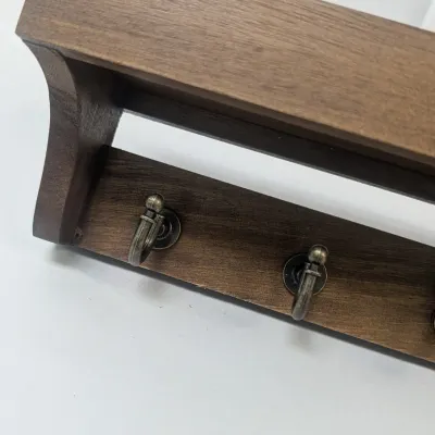 Pair Of Coat Hangers 1 Metal & 1 Wood