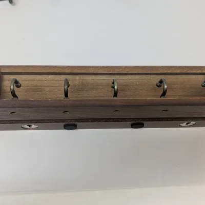 Pair Of Coat Hangers 1 Metal & 1 Wood
