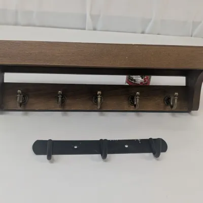 Pair Of Coat Hangers 1 Metal & 1 Wood
