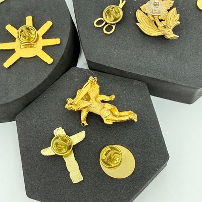 LOT 327: Gold Tone Pin Collection