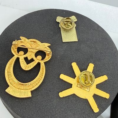 LOT 327: Gold Tone Pin Collection