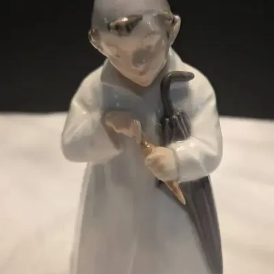 Royal Copenhagen Porcelain Figurine Titled "The Sandman" (Ole Lukøje), by Christian Model #1145