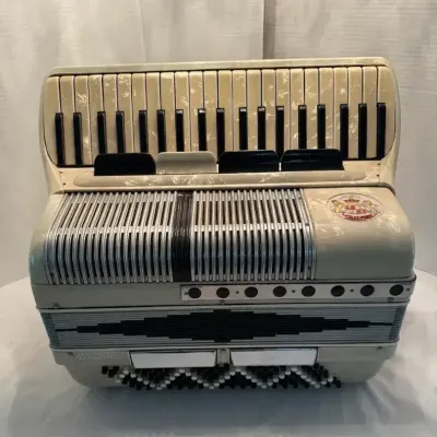Vintage Piano Accordion, Noble Juniorette Model Built With A Pearloid Finish 
