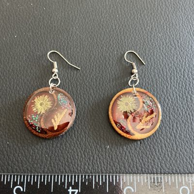 Sale Photo Thumbnail #103: Beautiful resin earrings with floral inserts 
Please see attached pictures
