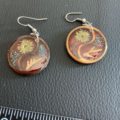 Sale Photo Thumbnail #112: Beautiful resin earrings with floral inserts 
Please see attached pictures