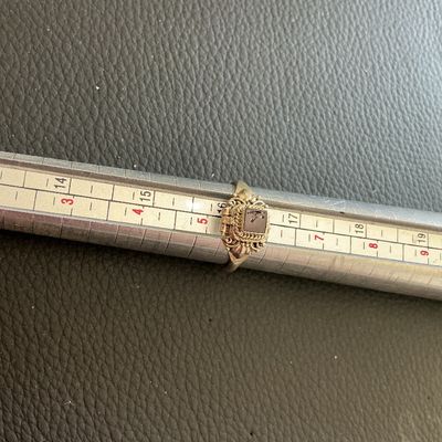 Sale Photo Thumbnail #136: Vintage 925 marked snuff ring with a dark red colored stone 
Please see attached pictures