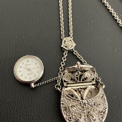 Sale Photo Thumbnail #11: Vintage silver tone necklace with hand bag pendant with hidden watch untested 
Please see attached pictures