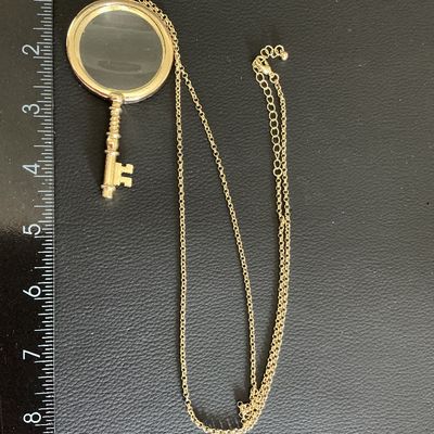Sale Photo Thumbnail #42: Vintage style gold tone key magnifying glass pendant necklace 
Please see attached pictures