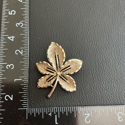 Sale Photo Thumbnail #18: Vintage gold tone Sarah Coventry leaf brooch 
Please see attached pictures