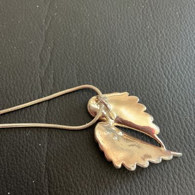 Sale Photo Thumbnail #206: Very cute silver tone winged fashion pendant necklace 
Please see attached pictures