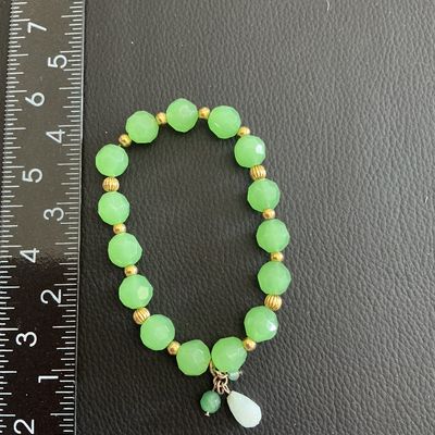 Sale Photo Thumbnail #98: Vintage Green Beaded stretchy bracelet 
Please see attached pictures