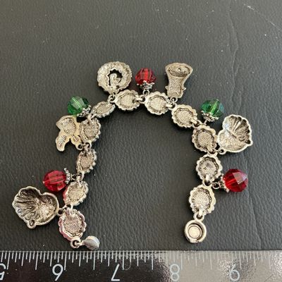 Sale Photo Thumbnail #227: Vintage Christmas fashion bracelet with charms 
Please see attached pictures