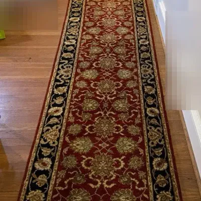 Burgundy, Black, and Tan Vet Color Area Rug