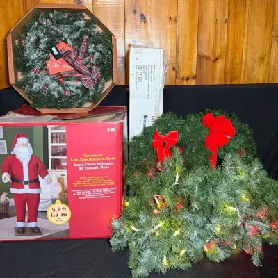 Animated Life Size Santa, 3 Ft Tree, Wreaths, and Lighted Garland 