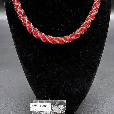 Red Toned Necklace And Pins