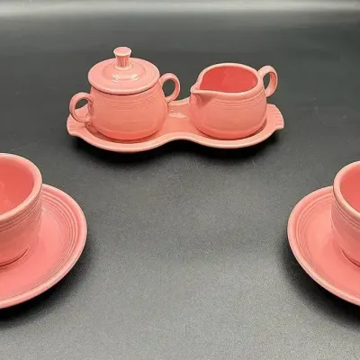 Two Fiestaware Teacup And Saucer Sets And A Sugar And Creamer Set In Rose