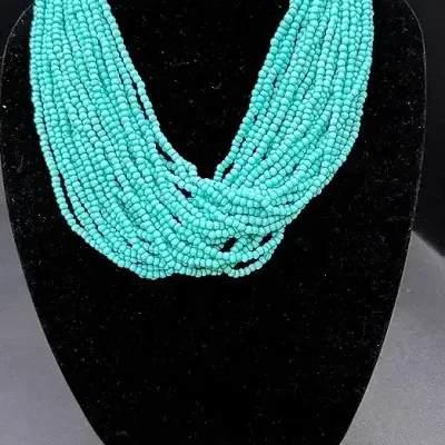 Turquoise Colored Beaded Necklace And Earrings