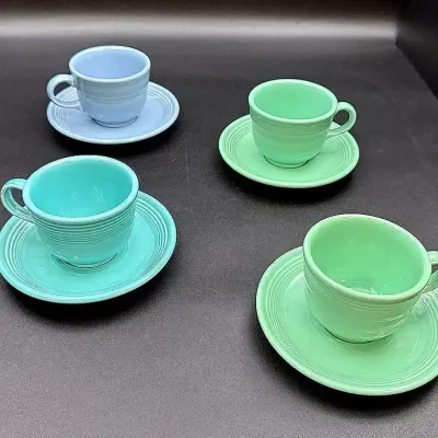 Fiestaware Teacup And Saucer Sets In Meadow, Turquoise And Periwinkle