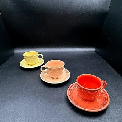 Fiestaware Teacup And Saucer Sets In Sunflower, Apricot And Persimmon