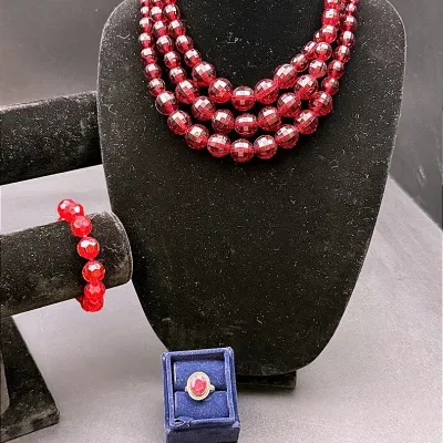 Red Toned Lot Featuring a Stauer Sterling Silver 2CT Ruby Ring 