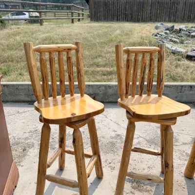 Sale Photo Thumbnail #5: Wood cabin style rustic swivel bar stools.