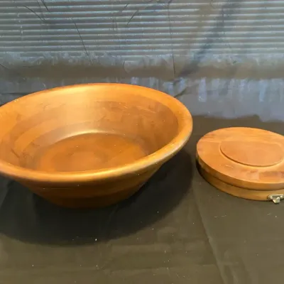 vintage Hellerware walnut salad bowl set on a tripod stand, featuring a rotating base.