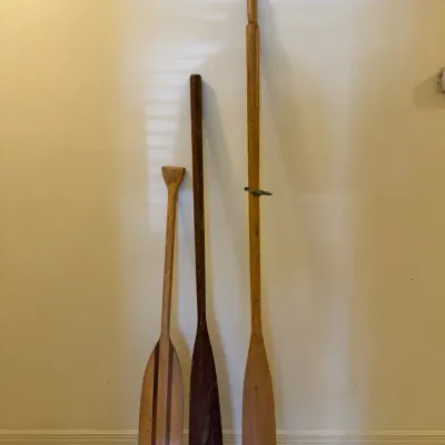 three vintage wooden canoe paddles 