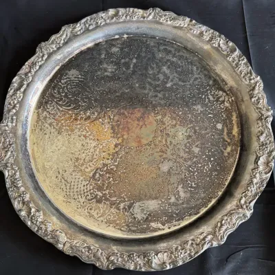 Vintage Round Silver-Plated Serving Tray Ornate Chased Floral Center, Scalloped Scroll Rim.