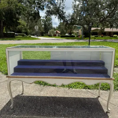 Vintage Queen Anne-style glass jewelry display showcase