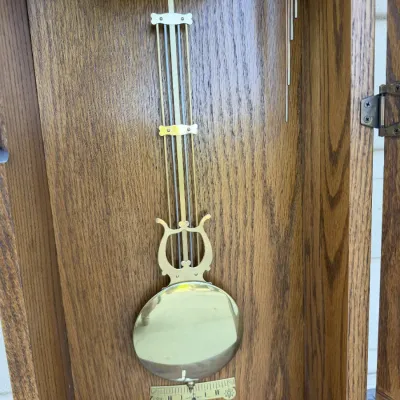 Howard Miller Oak Wall Clock Model 613-110 – Key-Wound Pendulum Chiming Clock with Original Keys