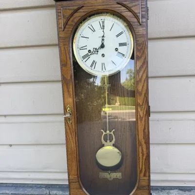 Howard Miller Oak Wall Clock Model 613-110 – Key-Wound Pendulum Chiming Clock with Original Keys