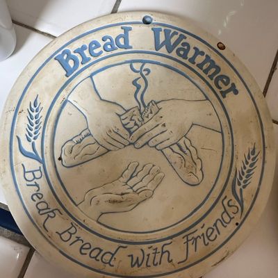 Lyn Ulick 1989 Ceramic Bread Warmer with Hands Breaking Bread motif