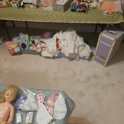 Tons of vintage doll clothes