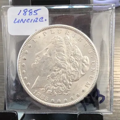 Sale Photo Thumbnail #230: 1885 Morgan Dollar Coin in Protective Sleeve