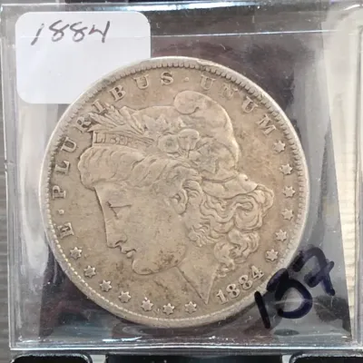 Sale Photo Thumbnail #224: 1884 Morgan Dollar Coin in Plastic Holder