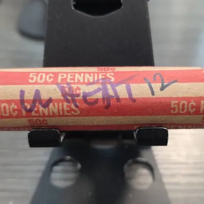 Sale Photo Thumbnail #34: 50 Cent Roll of Pennies