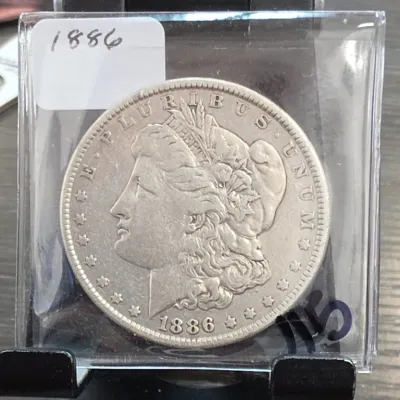 Sale Photo Thumbnail #202: 1886 Morgan Dollar Coin