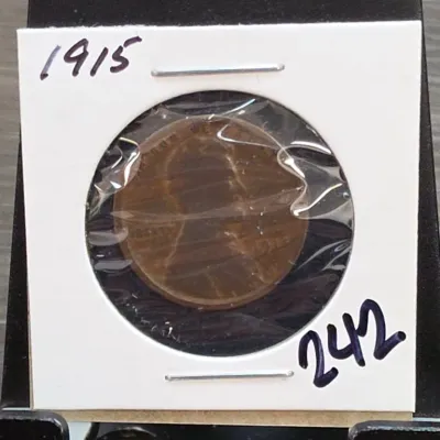 Sale Photo Thumbnail #329: 1915 Lincoln Wheat Cent in 2x2 Holder