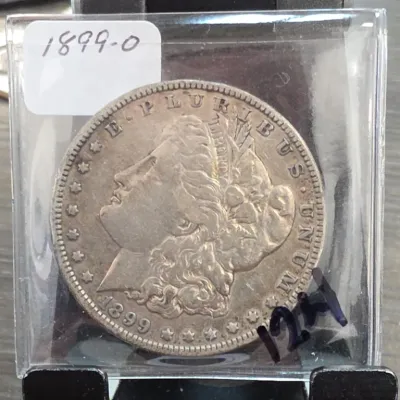 Sale Photo Thumbnail #211: 1899-O Morgan Dollar Coin