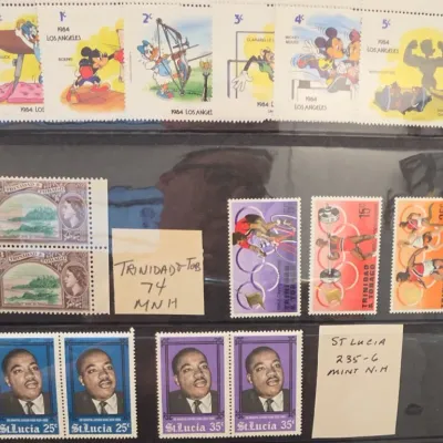 Sale Photo Thumbnail #147: Assorted Trinidad, St. Lucia, and Disney Postage Stamps