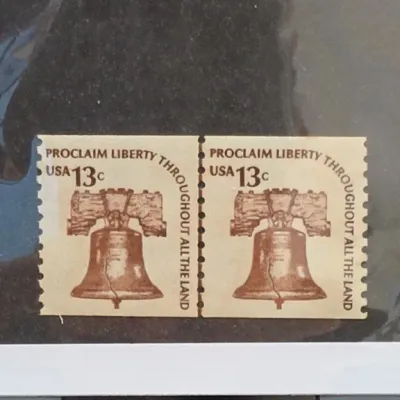 Sale Photo Thumbnail #45: Pair of USA 13c Liberty Bell Postage Stamps