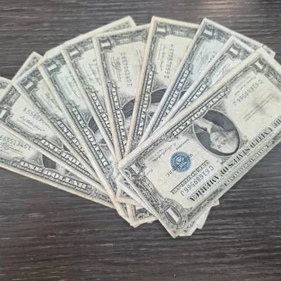 Sale Photo Thumbnail #116: Assorted United States Silver Certificates and Dollar Bills