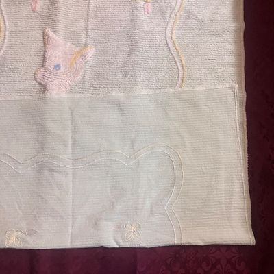 Sale Photo Thumbnail #1155: 38”x65” Blue vintage cotton chenille baby crib blanket or coverlet featuring a tufted white fawn or deer design in the center with pastel floral accents